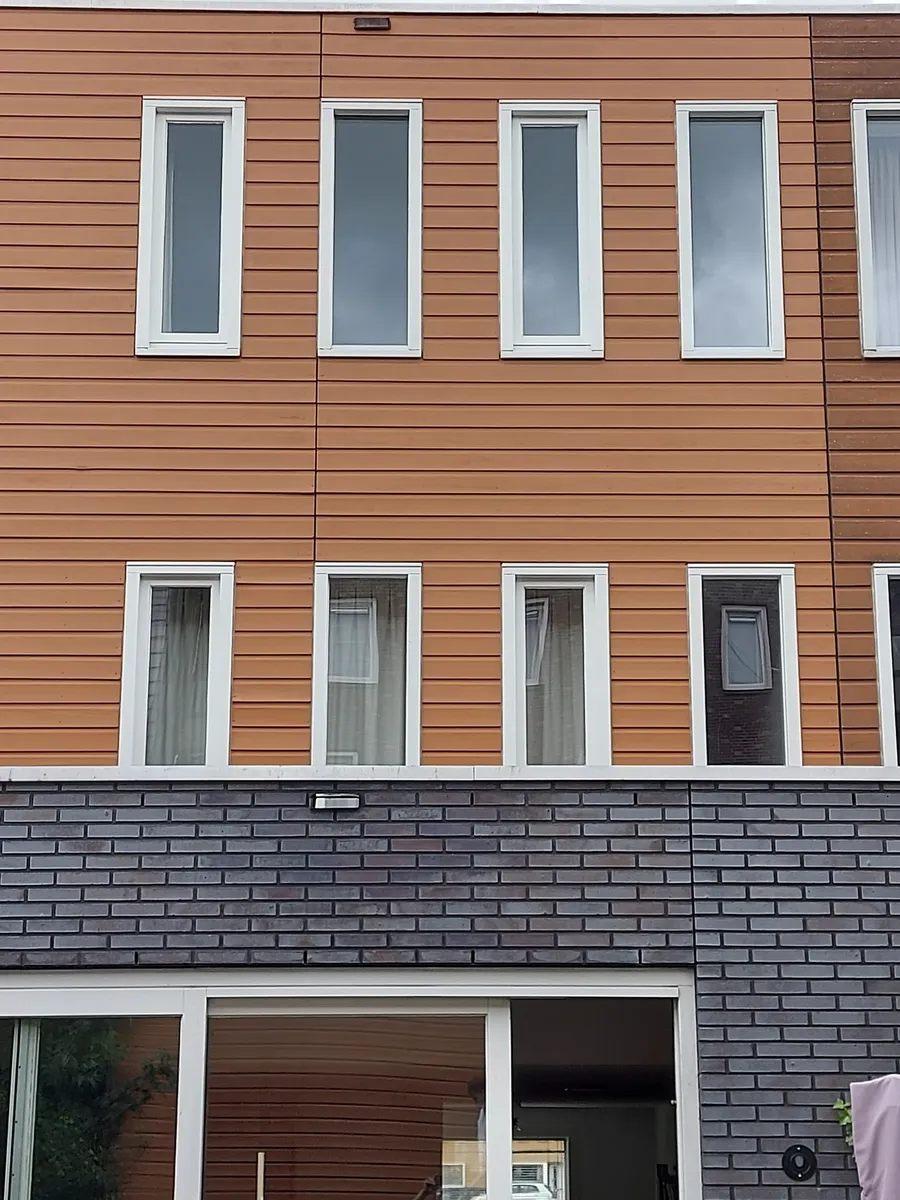 Houten gevel en bergingen in Groningen — schilderwerk door Bontbouw