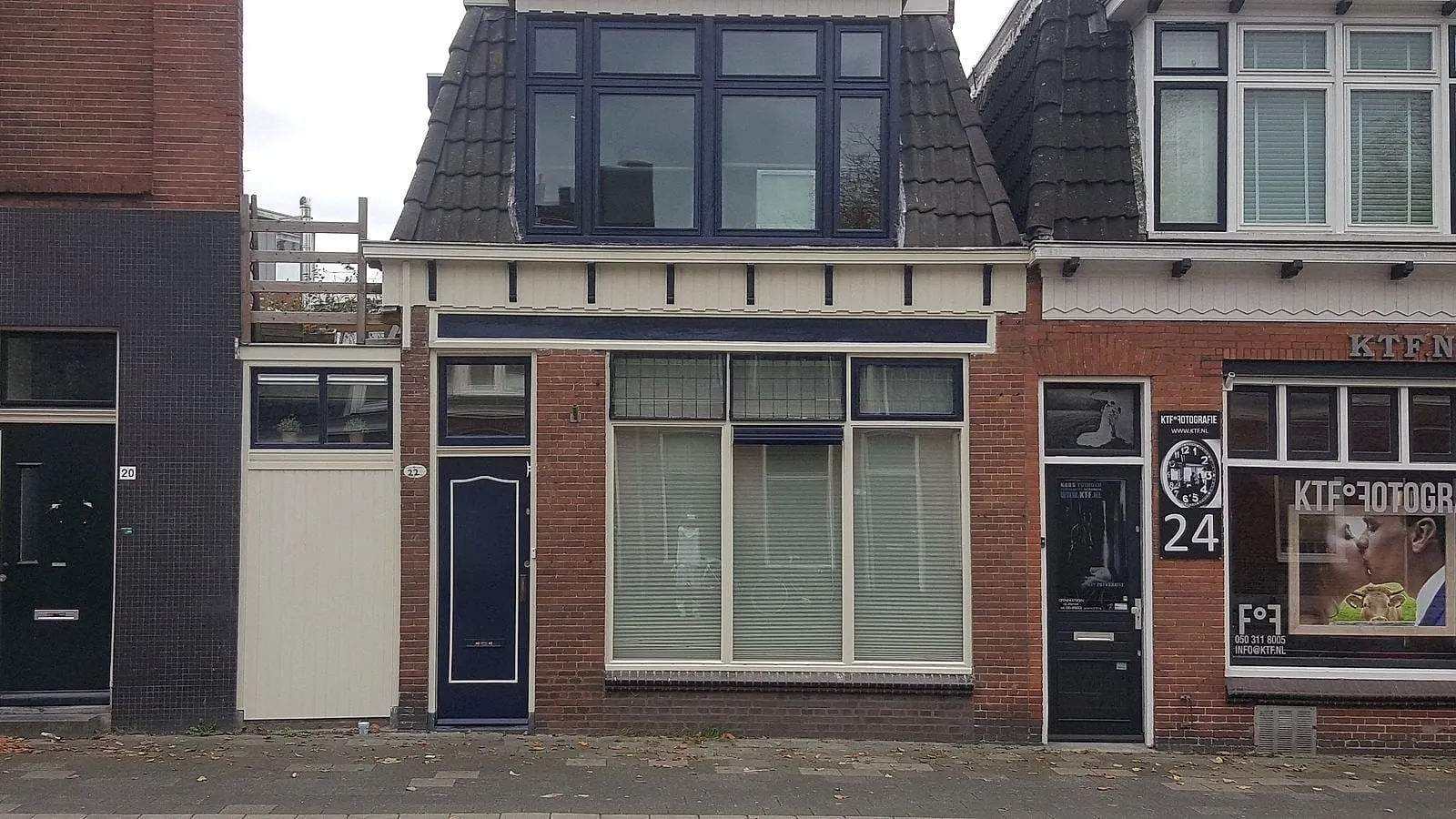 Winkelpui met donkerblauw schilderwerk na het werk — schilderwerk in Eeldersingel door BontBouw